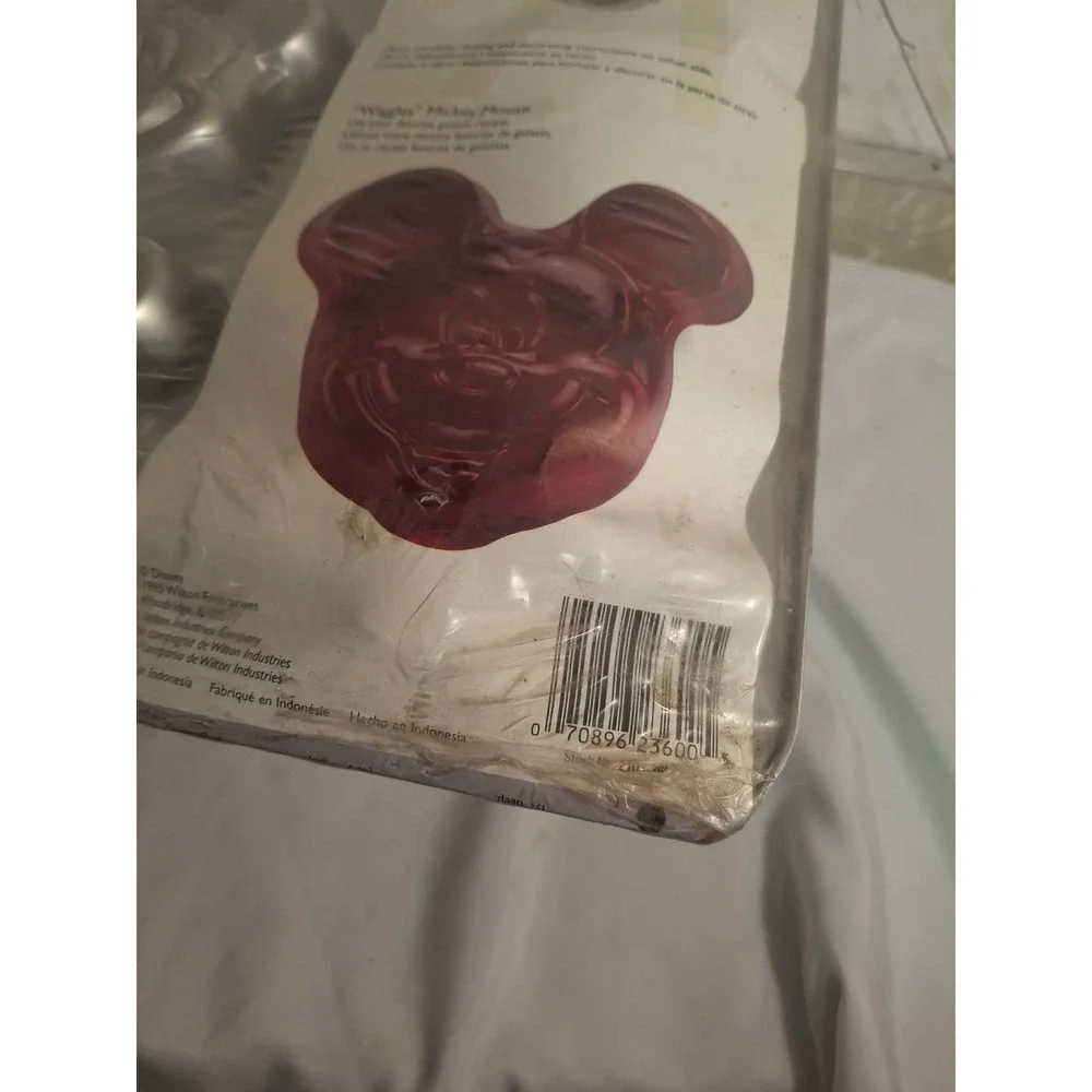 Mickey Mouse Mini Pan For Cakes. New . In Factory Seal. 6 shapes on pan.
